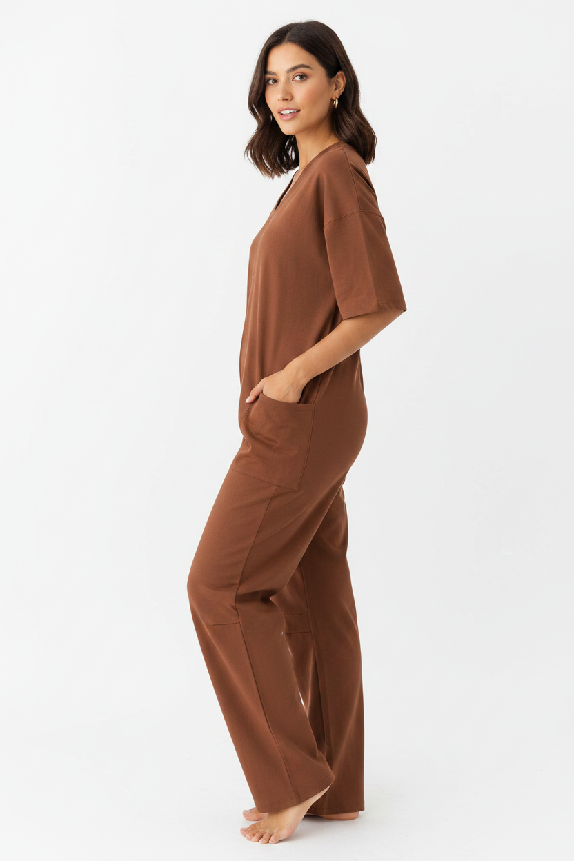 Hispanic model in brown V-neck jumpsuit